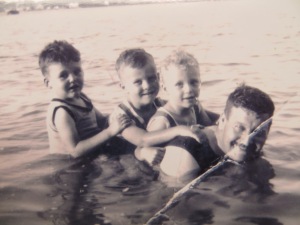 My father swimming with Ted, Rod and Jack